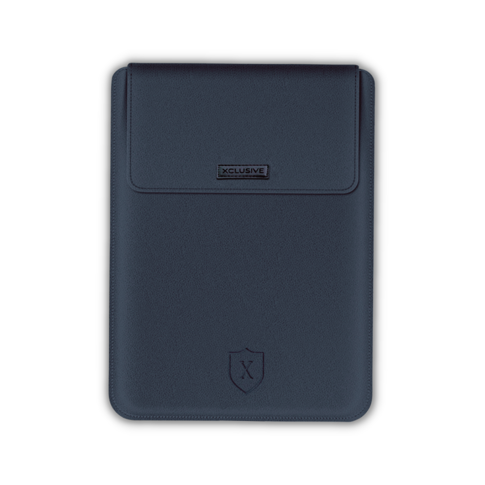 Closed Xclusive navy blue notebook sleeve with a notebook pro that transforms into a workstation viewed from the front